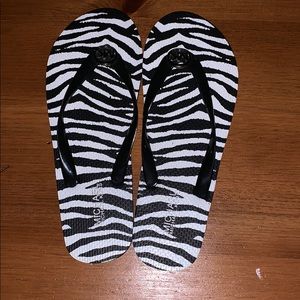 Micheal Kors zebra print flip flops